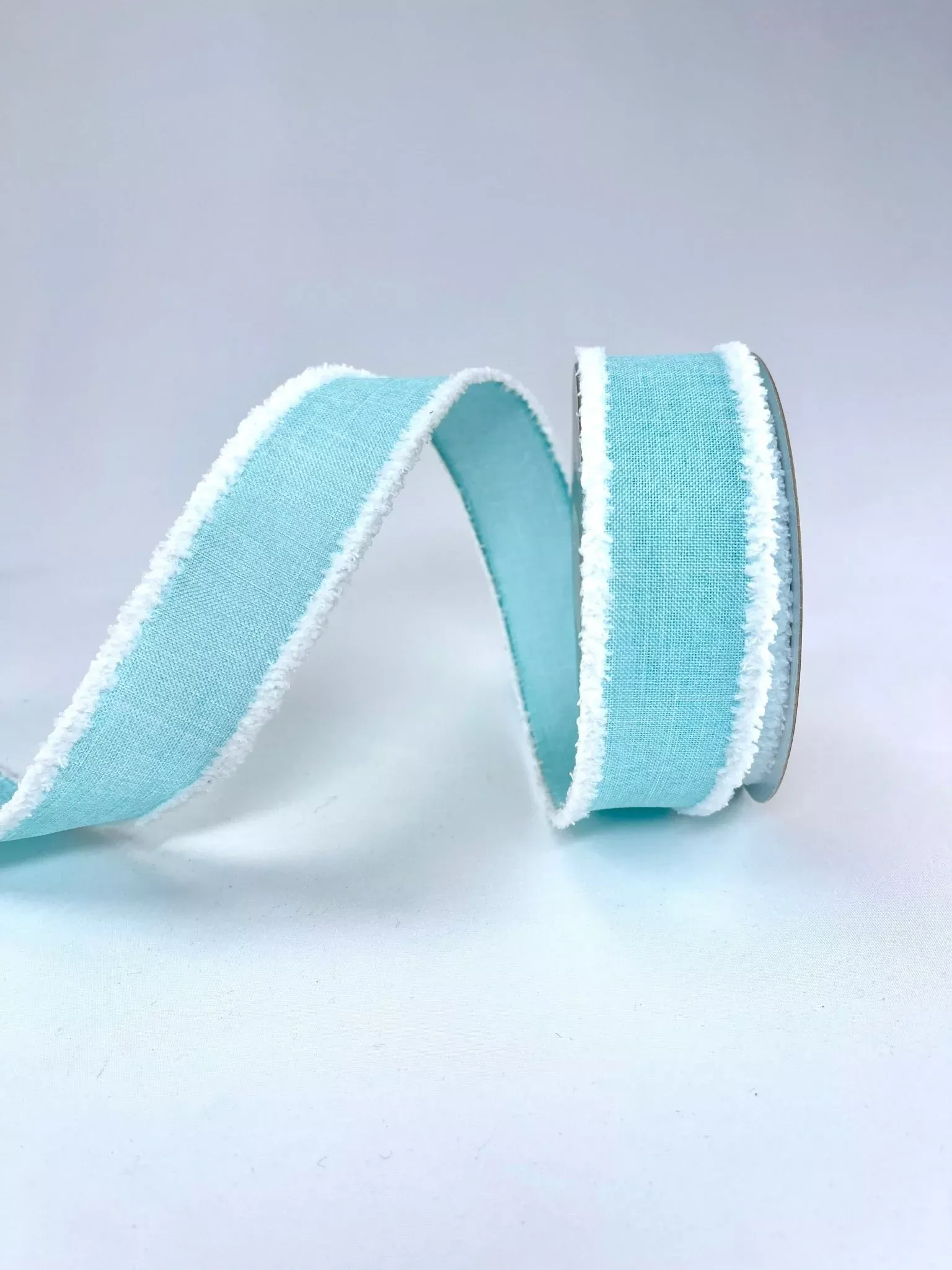 aqua linen with white fluffy edge 1.5” wired ribbon
