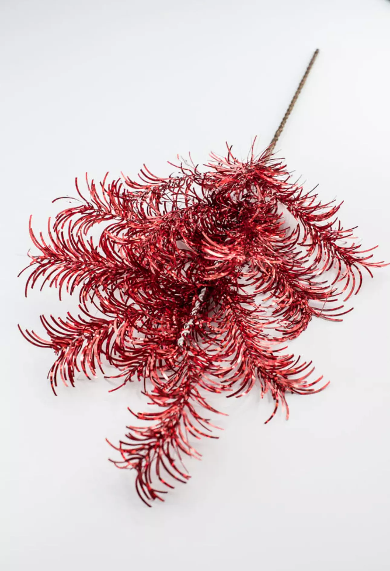 Red tinsel spray
