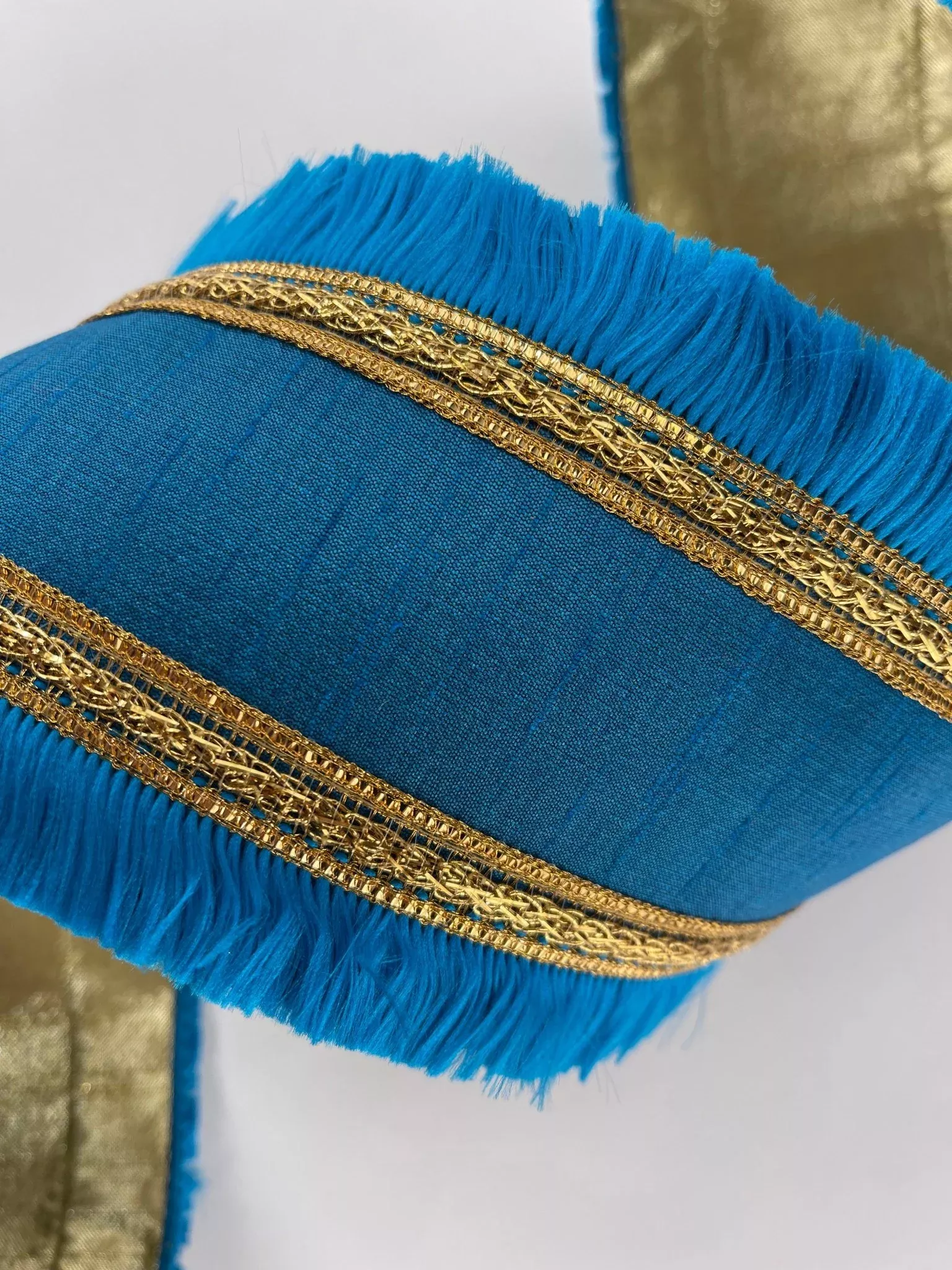 Turquoise with festival fringe edge 4” farrisilk wired ribbon