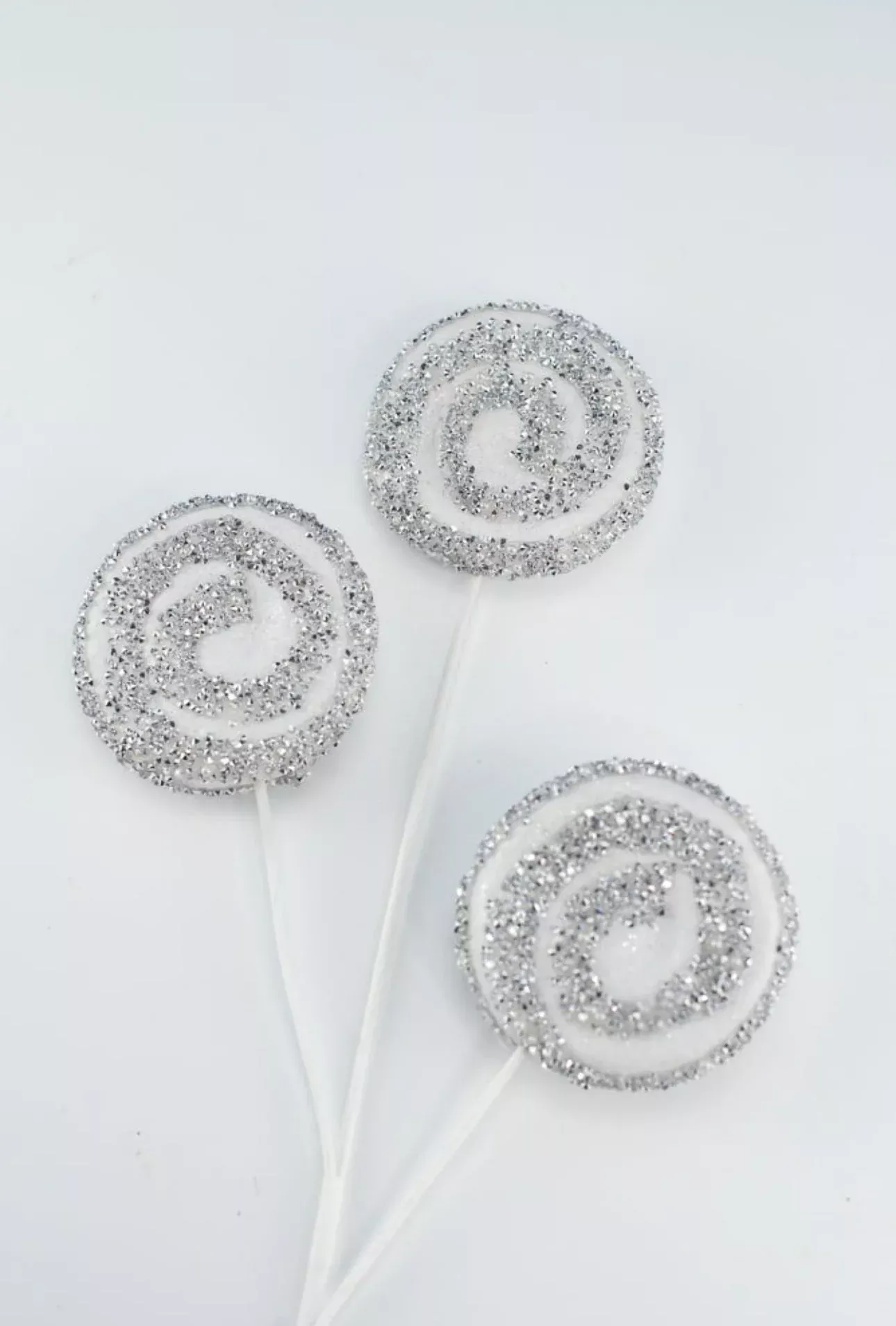 White and silver shimmering beaded peppermint candy spray