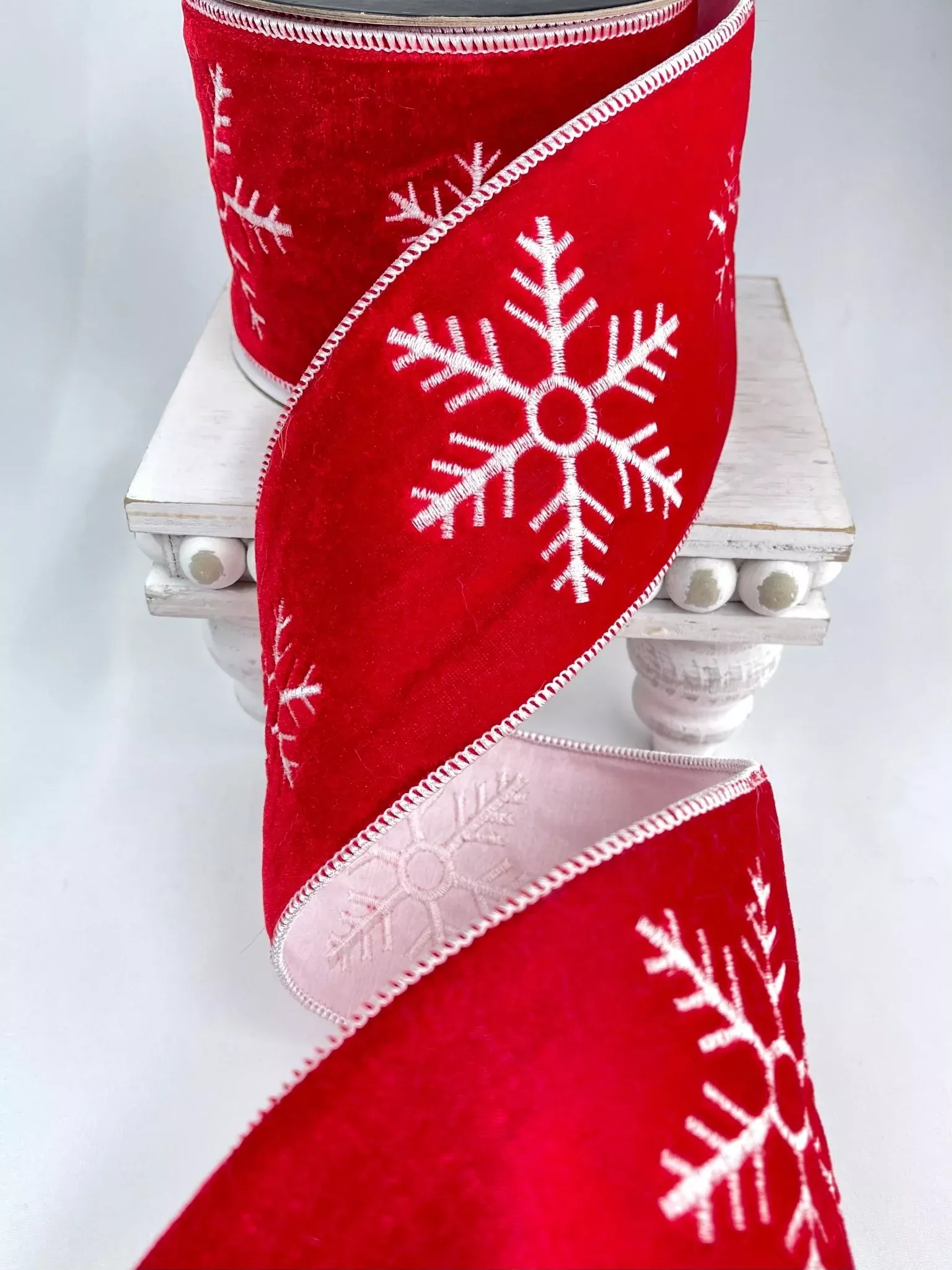 Winter snowflake on red velvet 4” wide wired ribbon